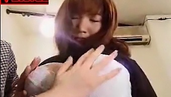 Two Japanese Girls Engage In Lesbian Kissing And Titlicking