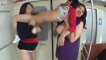 Two Voluptuous Japanese Ladies Engage In Titty-Fucking