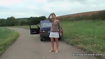 Young And Adorable Girl Entices Elderly Man In Public Place