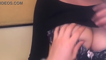 A Busty Teenage Japanese Girl Has Her Breasts Fondled In A Sensual Manner