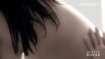 Stunning Babes Silvie Deluxe And Lucy Li Assist Each Other In Reaching Climax In This Whiteboxxx Video